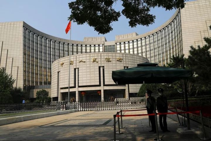 China will guard against yuan overshooting risks - PBOC publication