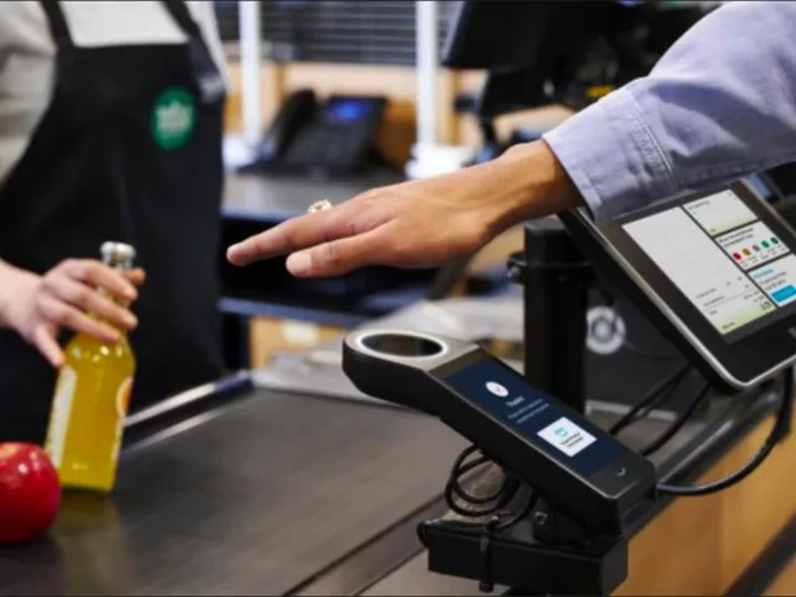 Amazon will let you pay with a wave of your hand at all Whole Foods stores