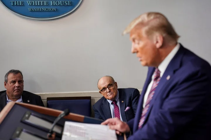 Trump news – live: Rudy Giuliani boasted about selling pardons with Trump for $2m, lawsuit claims