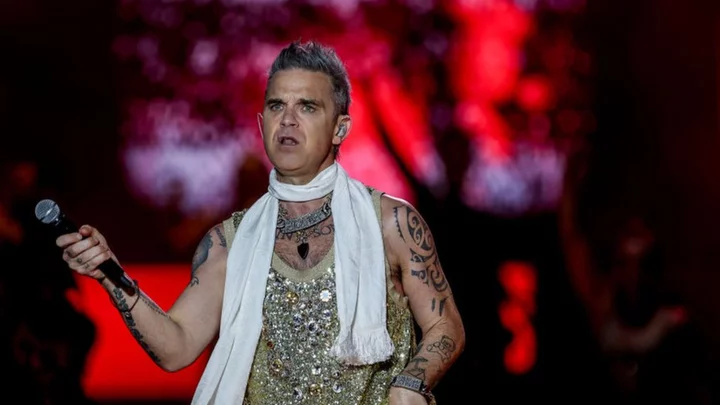 Robbie Williams fan dies after fall at Sydney concert