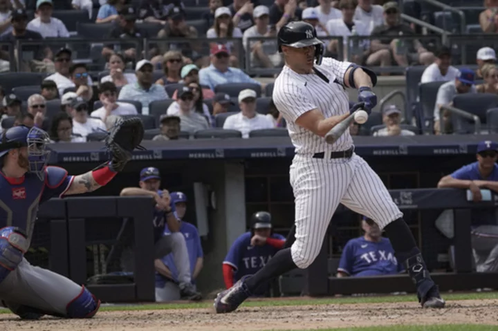 Bader's 2-run double in the eighth sends the Yankees past the Rangers 5-3