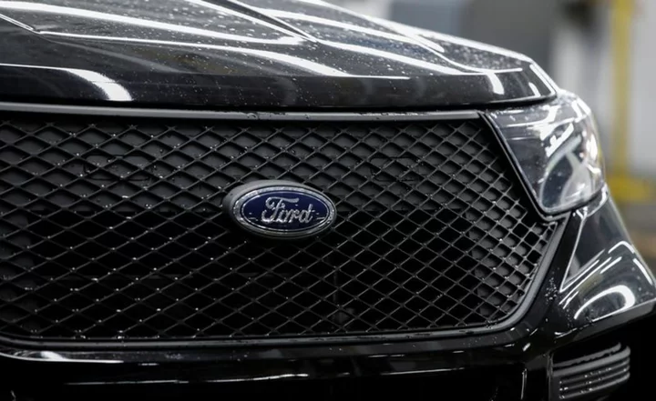 Ford expects to take about $270 million charge related to SUV, van recall