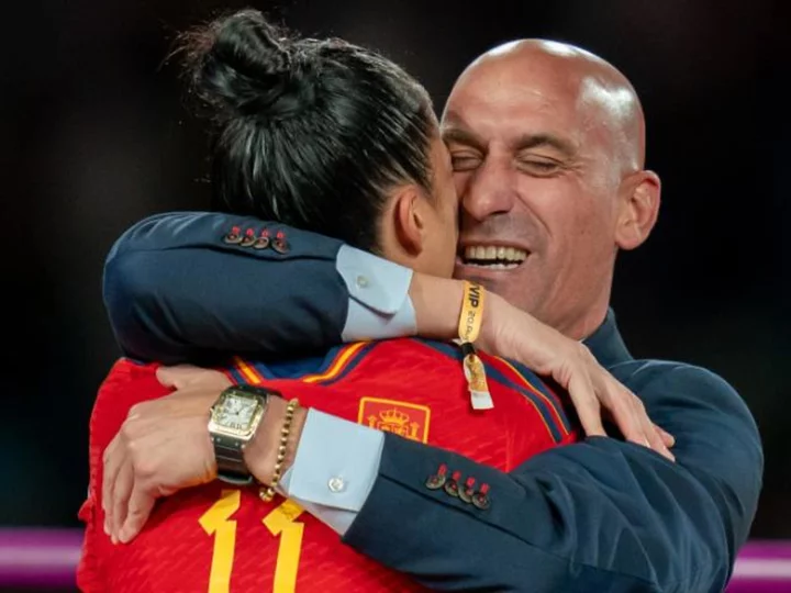 Spanish soccer chief Luis Rubiales faces criticism after giving World Cup winner Jennifer Hermoso a surprise kiss on the lips after she receives gold medal