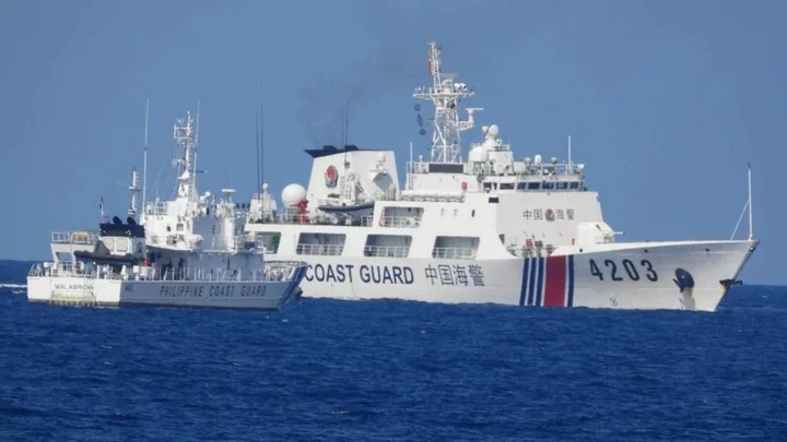 Philippines accuses China of firing water cannon at boats in South China Sea